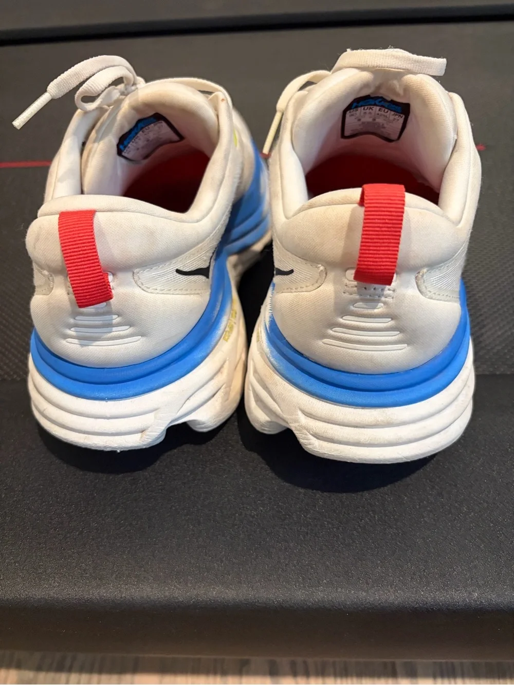 Hoka White Trainers with Blue Midsole and Red Outsole
